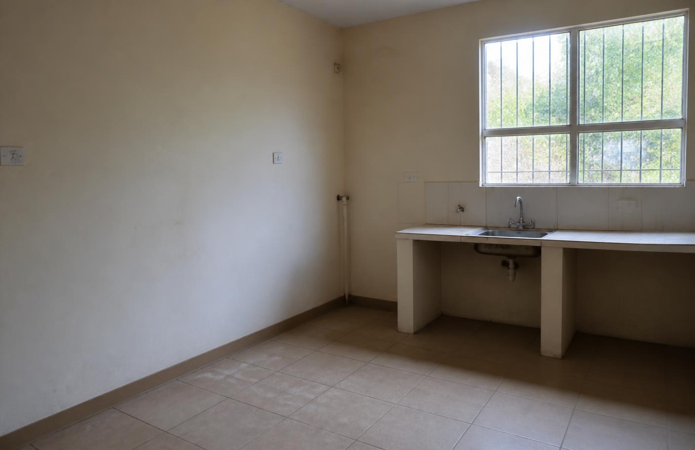 Bare kitchen space before modular installation